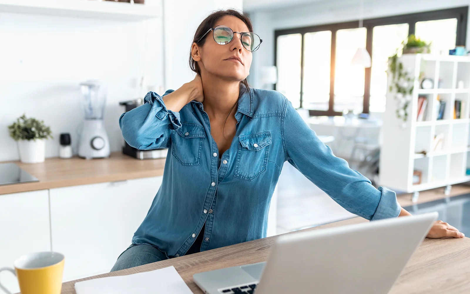 Woman in her 40s reading about early perimenopause symptoms