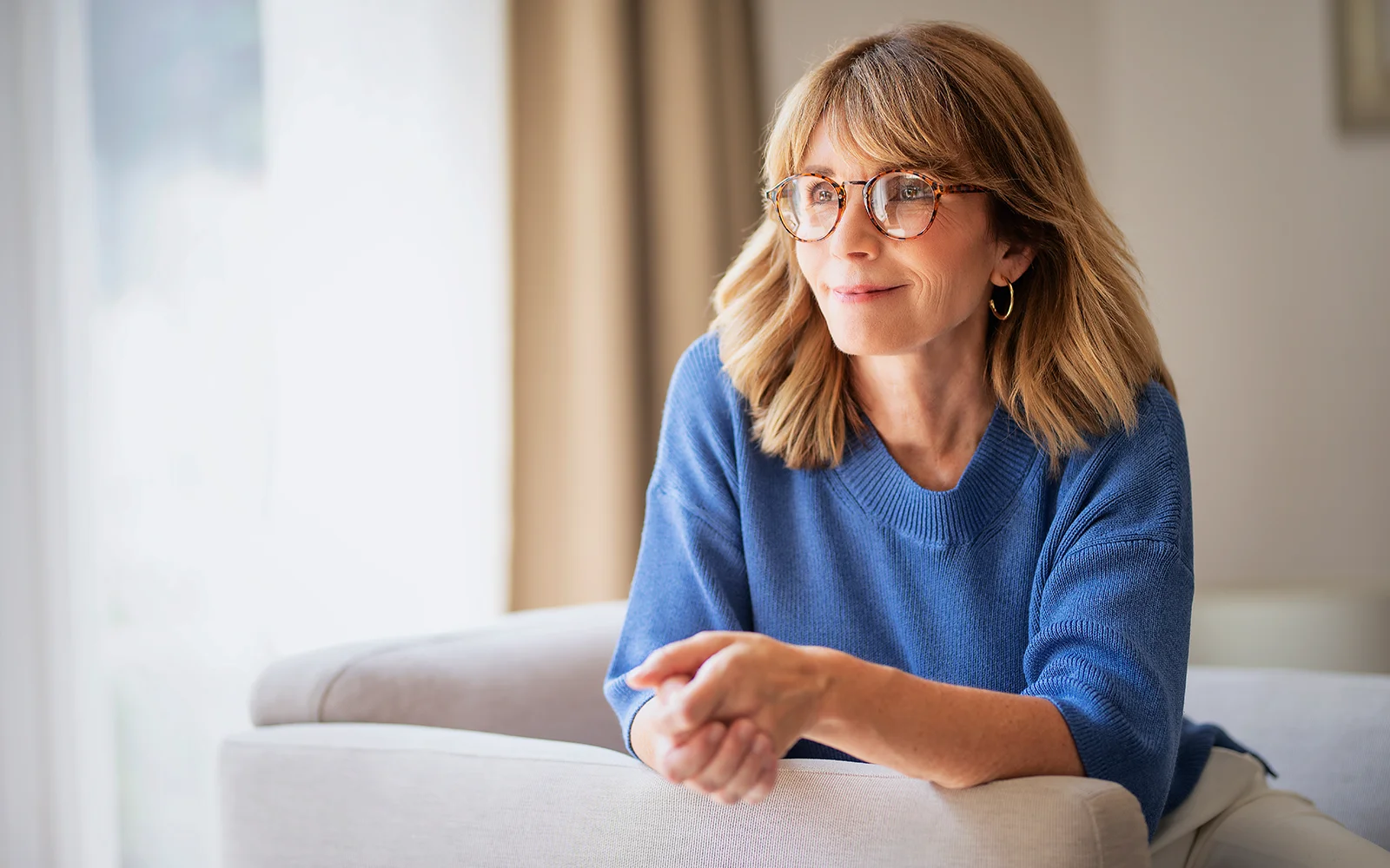 Woman in her 50s talking with her provider about hormone therapy options